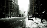 Black and white photo of a snowy, frosty New York